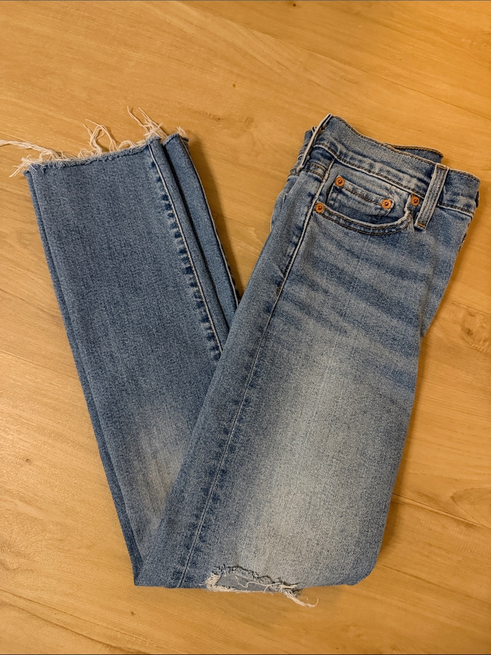 Women’s Light Blue Distressed Straight Jeans